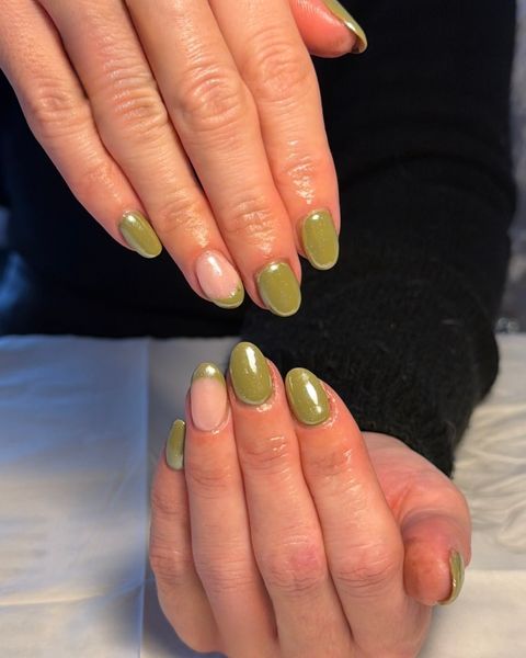 Olive green chrome gel nails with one soft nude accent nail